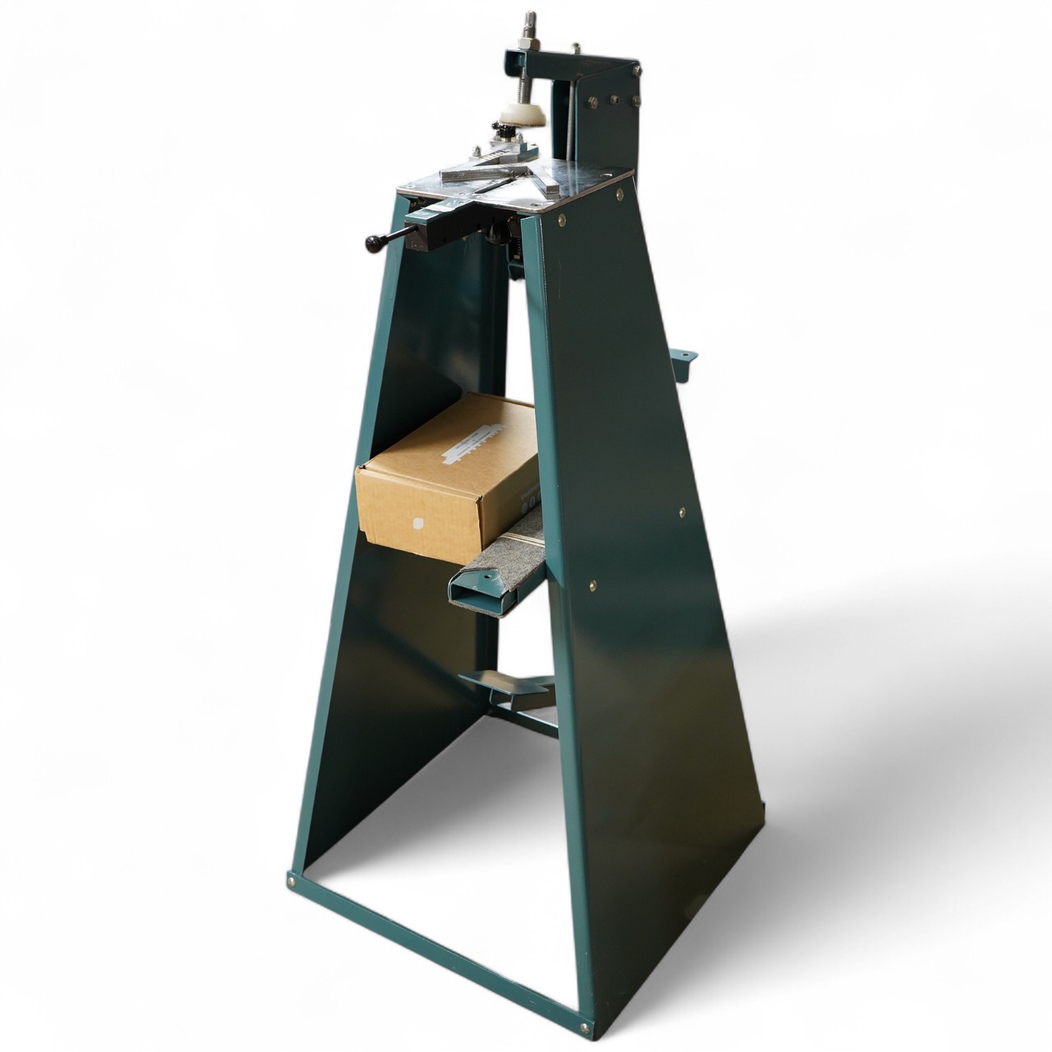 An Underpinner with two dissembled ‘arms’ and a box containing tools, accessories and manual